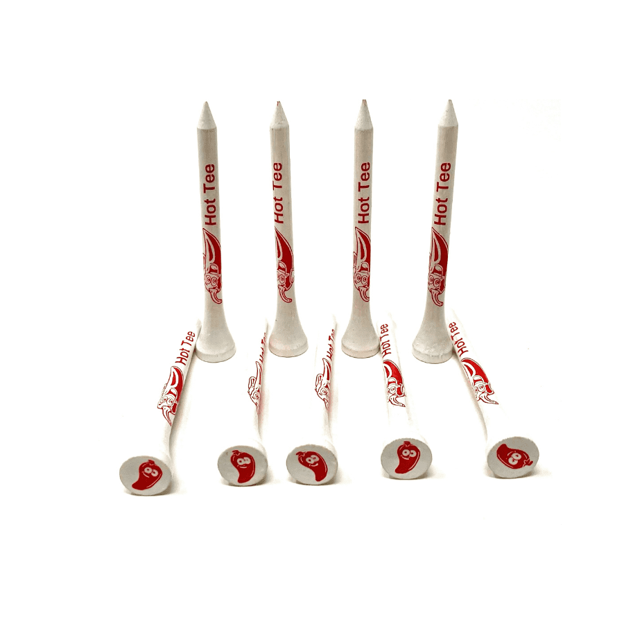 Six white golf tees with red peppers.