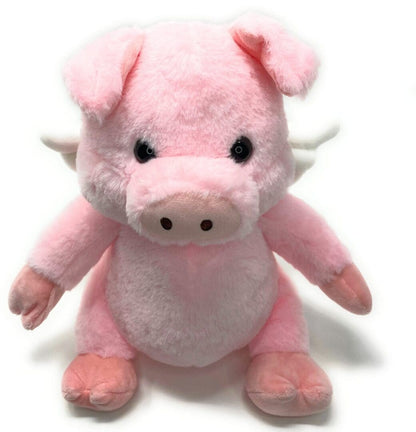 A pink stuffed pig with horns on its head.
