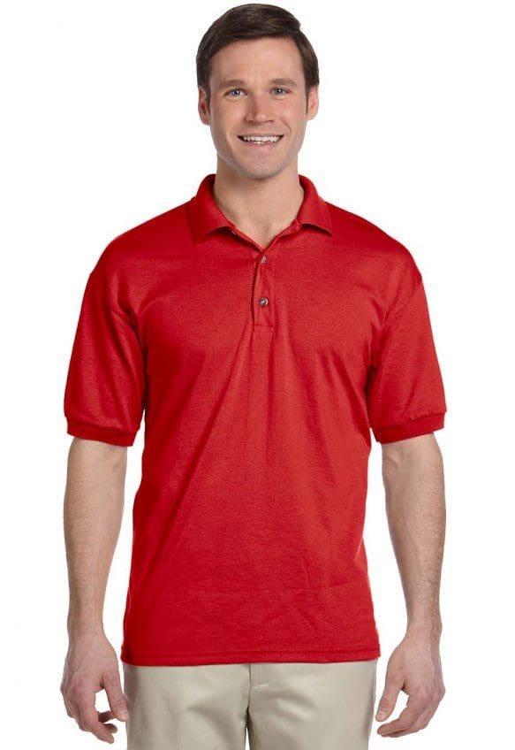 A man wearing a red shirt and holding his hand out to the camera.