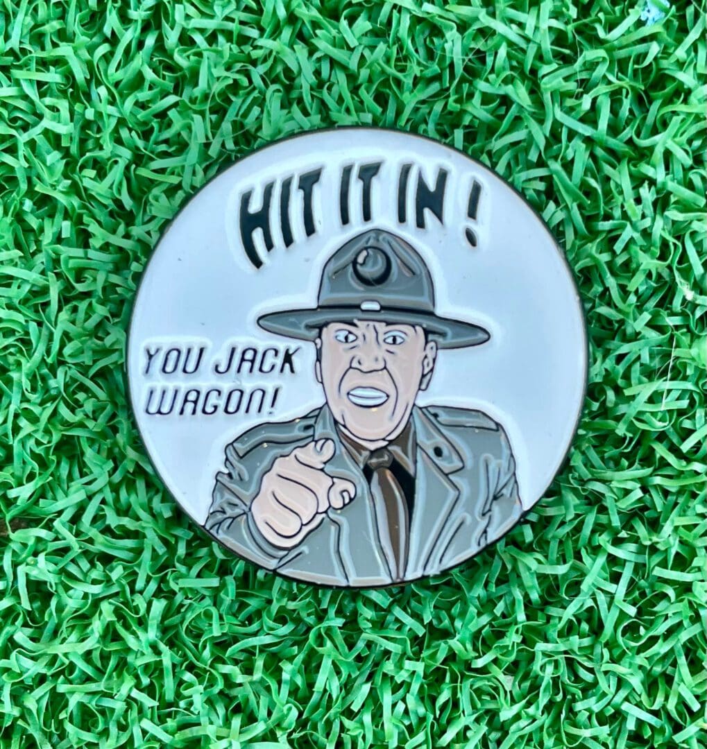 A pin that is on the ground with some type of image.